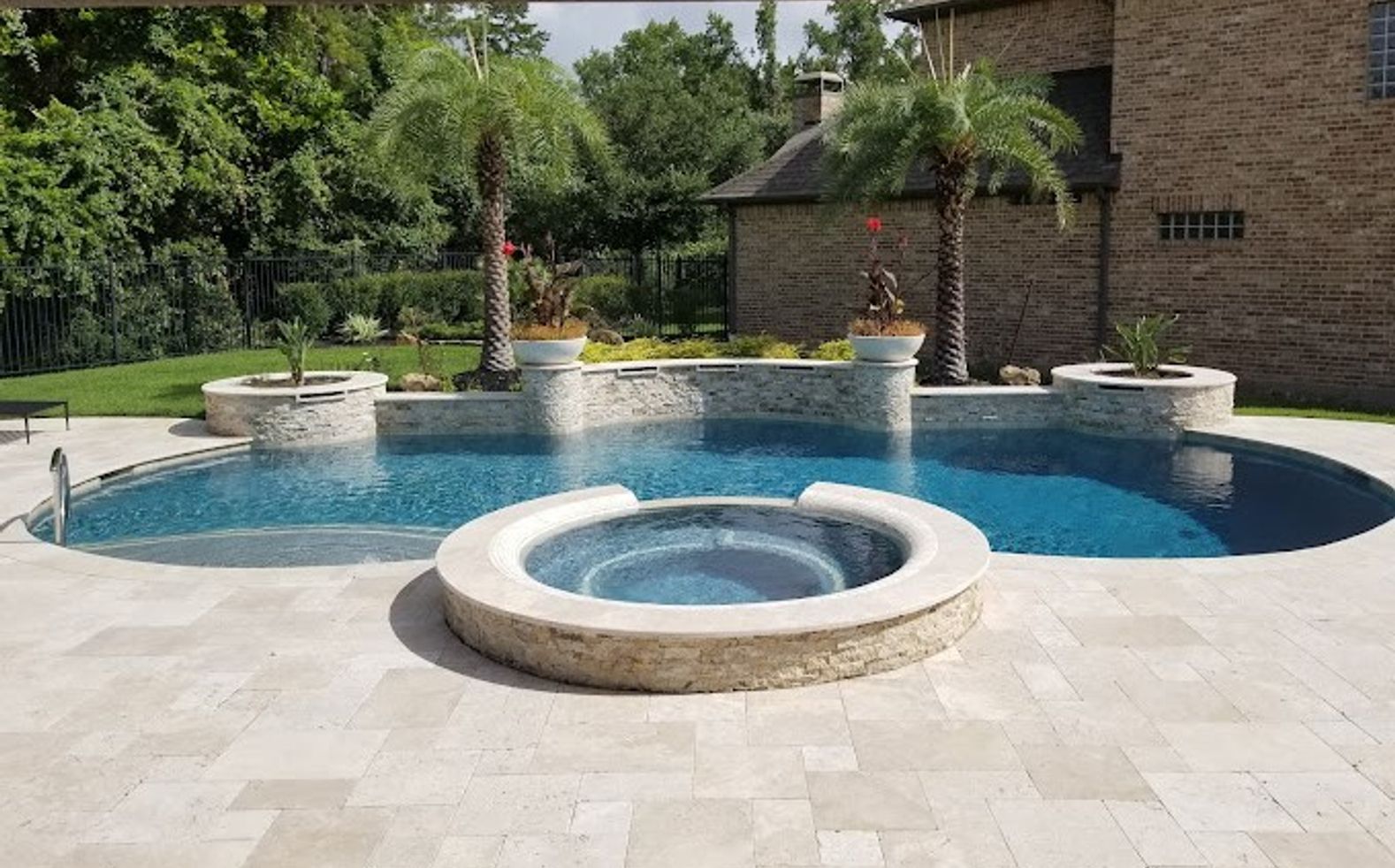 brown natural stone pool after a complete pool restoration